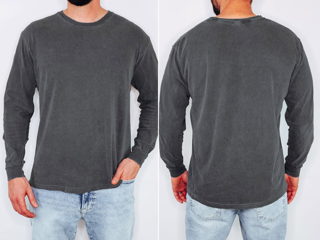 A male model wearing a dark grey t-shirt showing both front and back of the t-shirt